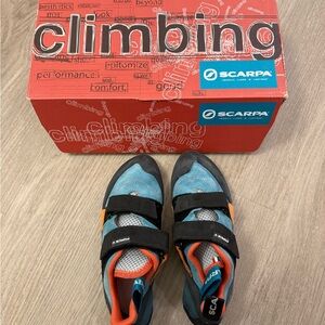 Scarpa Climbing Shoes with Red and Blue Accents